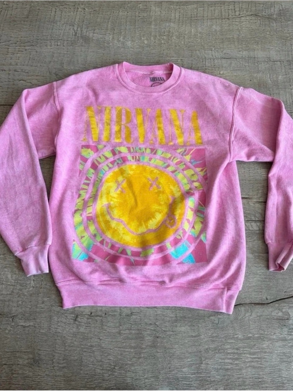 NIRVANA Pink Crewneck Sweatshirt with Yellow Smiley Graphic
